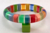 JE29 Judith Evans clear resin bangle with multicolored rods